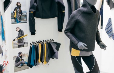 Sportswear designs with a mannequin wearing a baseball cap, jumper and leggins