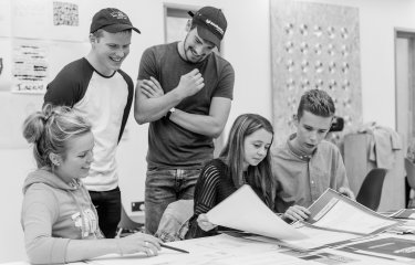 Students working in the Graphic Design Studio at Falmouth University