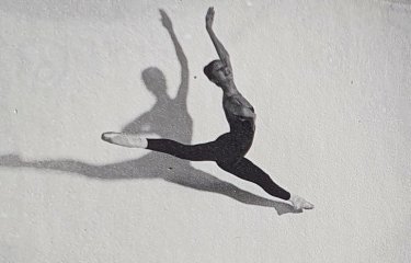 Julie Felix ballerina jumping in the air