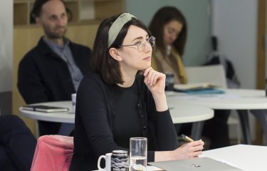 Student Anna Calandra sat in a meeting