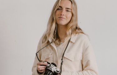 Marnie holding a camera 