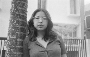 A grey scale headshot image of Gina Goh