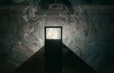 A silhouette of a TV in black and white 