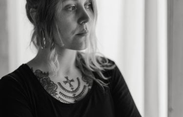 A woman stood in her studio