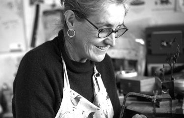 A woman at a workbench