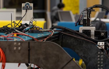 Close up shot of daffodil picking robot