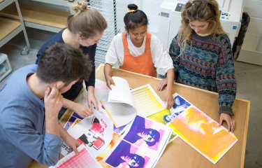 Students looking at work in studios