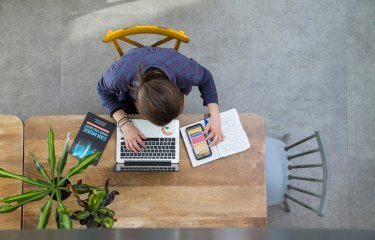 Online student working at their desk 