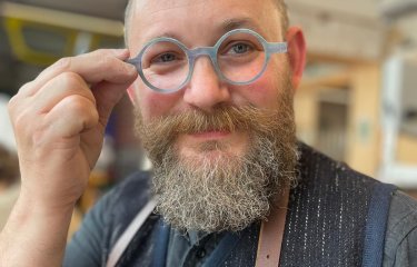 A man wearing glasses