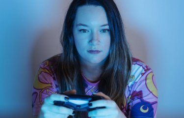 A woman playing a video game 