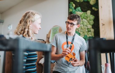Jake Causley talking to a student