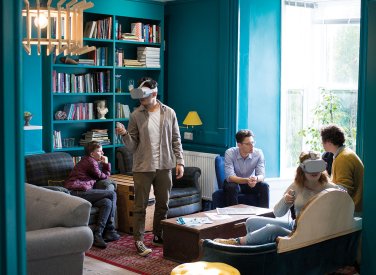 Students with VR headsets in writing studio