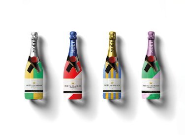 Bright coloured labelled champagne bottles