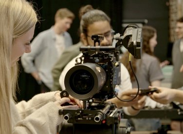 People using an ARRI camera as part of a demonstration