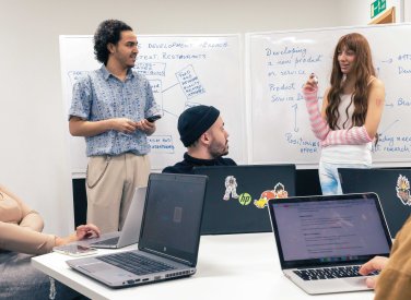 A group of people doing a presentation