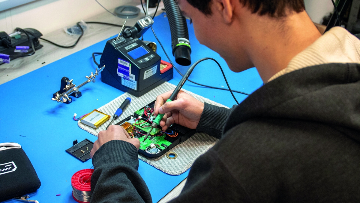 Creative Robotics Student Creative Robotics student working in robotics lab.