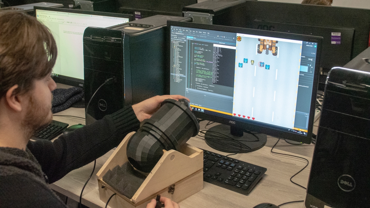 Games student using cannon controller