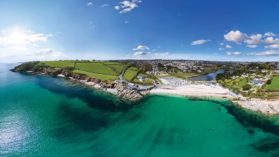 Aerial View Of Swanpool Beach with sea and cliffs