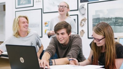 Architecture students working together and laughing