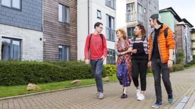 Students walking in Glasney Student Village at Falmouth University