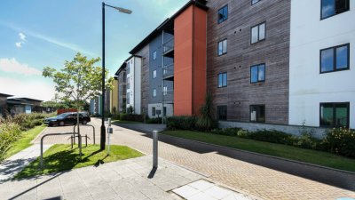 A block of student accommodation with a lamp
