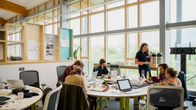 Students sat around a table in the AIR building