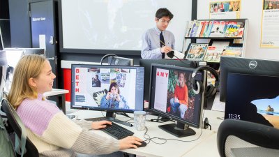 Falmouth University Media Production student looking at two computer screens