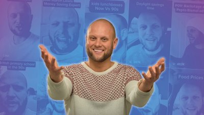 The comedian, Tom Glover, posing for a photo against a blue and purple background