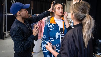 students styling model on set