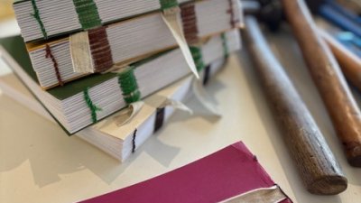 Cloth books in process of being restored