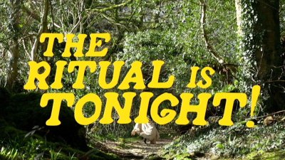 An image of a forest with the text 'The Ritual is Tonight!' in yellow text in the centre