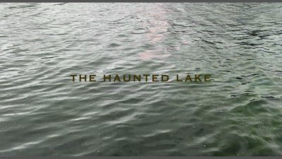 An image of rippling water with the text "The Haunted Lake" across the centre
