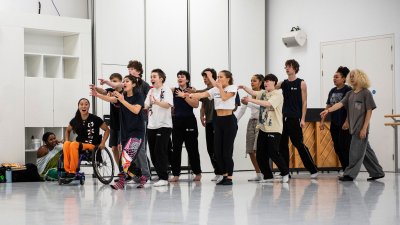 A group of young dancers in a line posing
