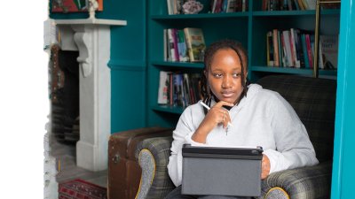 Digital marketing student working on laptop