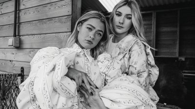 Black and white images of two female models in billowing clothes