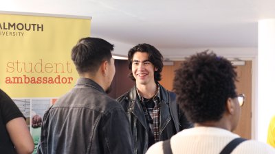International students chatting at a table