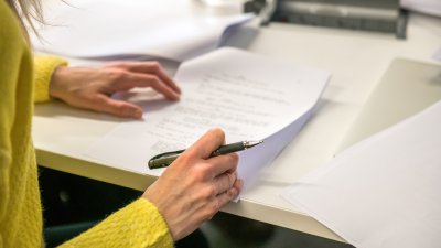 Person writing a script