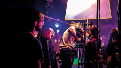 Students filming in a studio