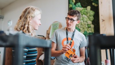 Jake Causley talking to a student