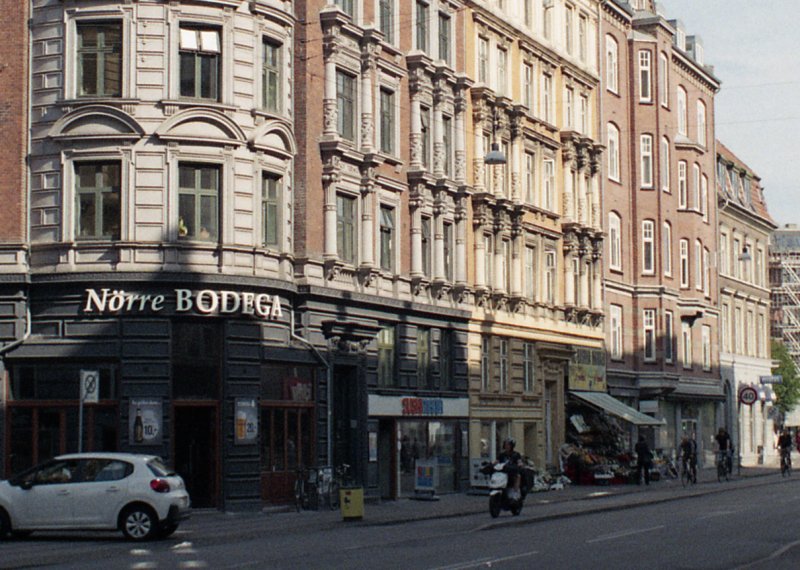 wide street in Copenhagen with people walking