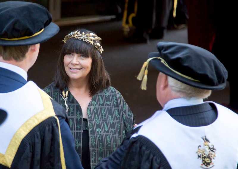 Dawn French at Falmouth University graduation speaking to two academics