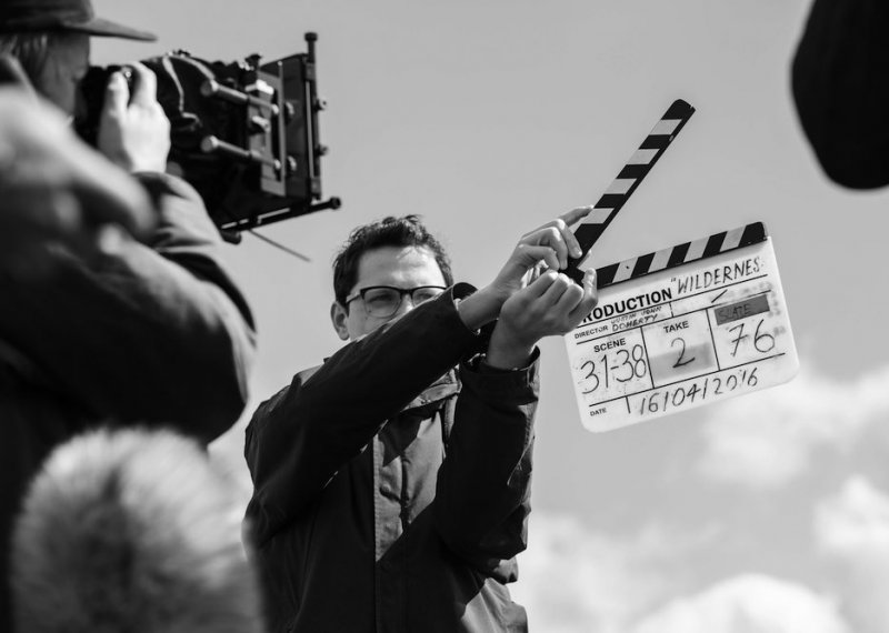 Falmouth University Film student using a clapperboard