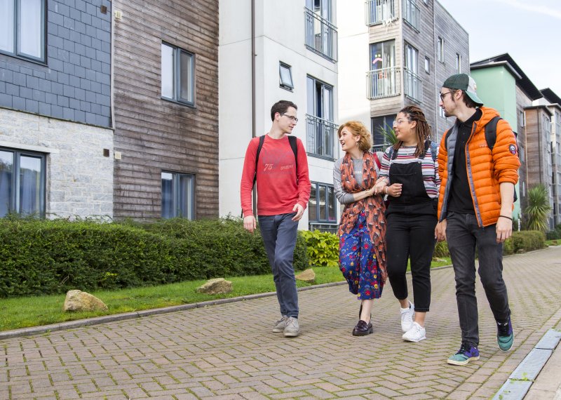 Students walking in Glasney Student Village at Falmouth University