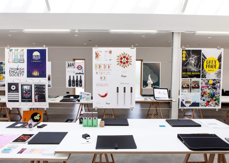 Graphic design work presentations suspended in studio at Falmouth University