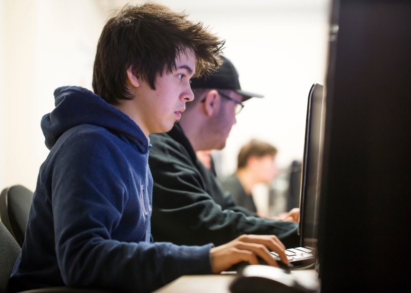 male student at a computer