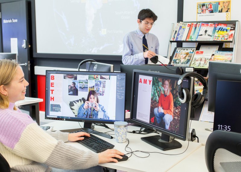 Falmouth University Media Production student looking at two computer screens