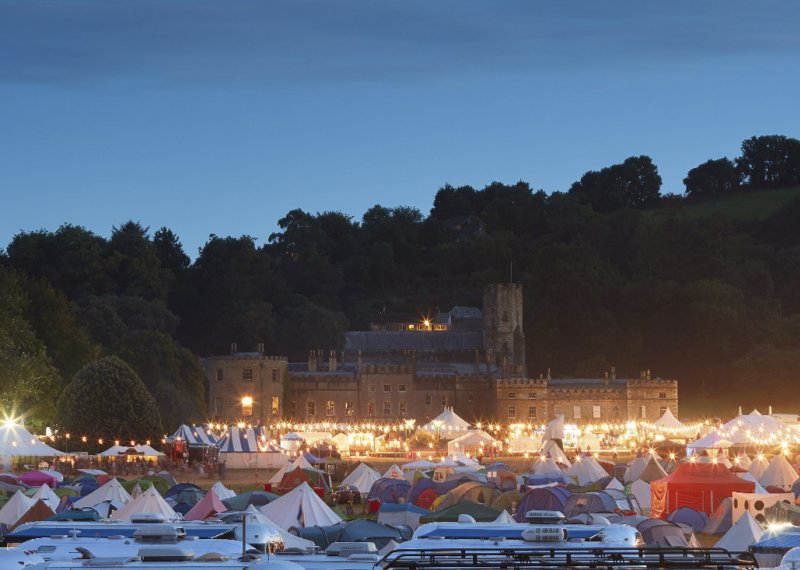 View of Port Eliot house at the festival, foreground covered in tents.