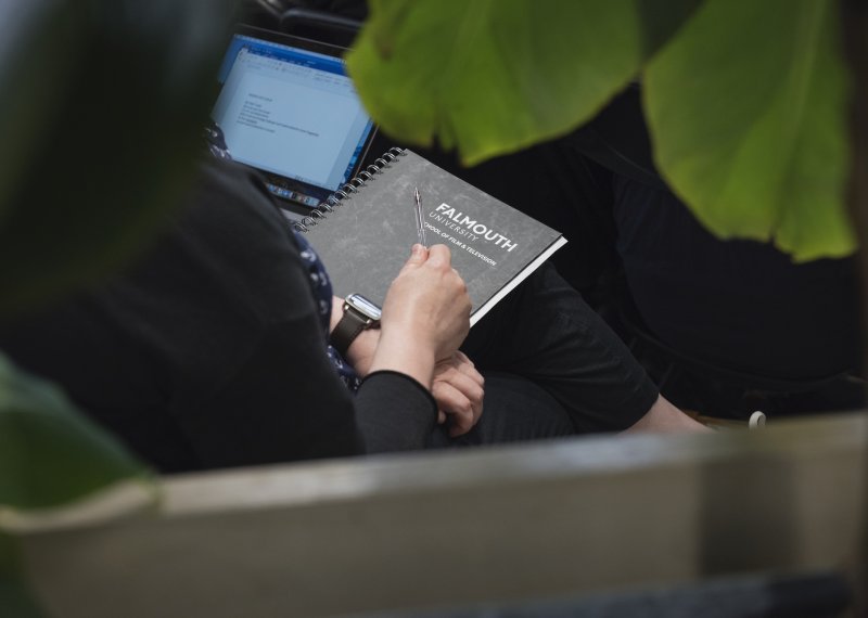 Close up of Falmouth University branded book