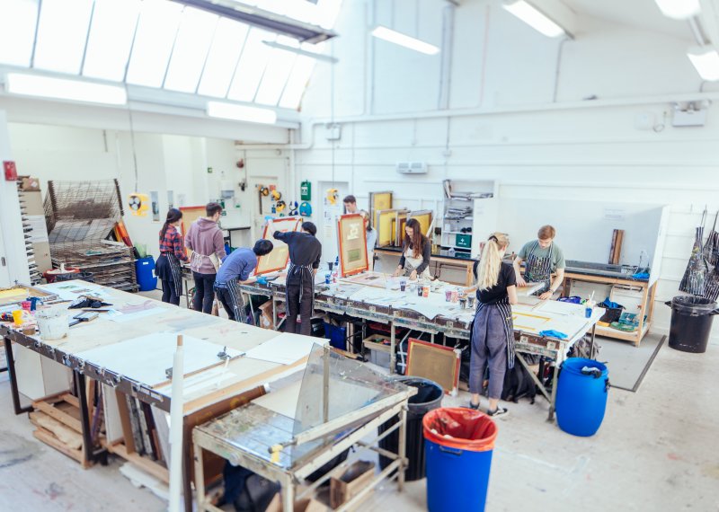 Students working in studio at a table