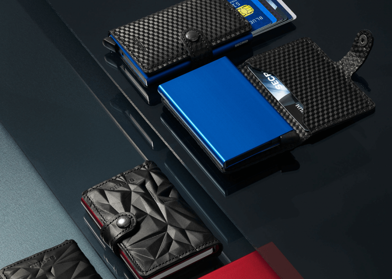 Leather wallets with blue and red cards